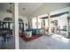 Bright and airy living room with high ceilings, stylish decor, and an open floor plan at 7705 Weeping Willow Cir, Sarasota, FL 34241