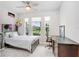 Well-lit bedroom offering a relaxing space with ample natural light and neutral tones at 31534 Westbury Estates Ave, Wesley Chapel, FL 33545