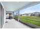 Covered lanai overlooking the backyard at 31534 Westbury Estates Ave, Wesley Chapel, FL 33545