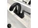 A modern black faucet on white countertop at 2607 Seagull Ln, North Port, FL 34286