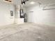 Spacious garage with utilities and a white block wall at 2607 Seagull Ln, North Port, FL 34286