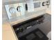 Close-up of a LG stainless steel stovetop with four burners and knobs at 2607 Seagull Ln, North Port, FL 34286