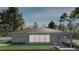 Rear view showcasing a spacious yard, a covered patio, and abundant natural light at 8301 Burwell Cir, Port Charlotte, FL 33981