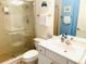 Bathroom featuring a glass enclosed shower and a stylish vanity with mirror at 19417 Gulf Blvd # B209, Indian Rocks Beach, FL 33785