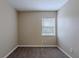 Standard bedroom with neutral walls, carpet flooring and a window at 3408 Phillips St, Tampa, FL 33619