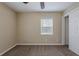 Comfortable bedroom with neutral walls, carpet, and a closet at 3408 Phillips St, Tampa, FL 33619