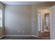 This is a well-lit bedroom with access to an ensuite bathroom at 3408 Phillips St, Tampa, FL 33619
