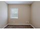 A standard bedroom with carpet flooring, and a window at 3408 Phillips St, Tampa, FL 33619