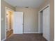 Standard bedroom with two entry doors and closet at 3408 Phillips St, Tampa, FL 33619
