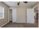 Bedroom featuring carpeted floors, neutral walls, a closet and a doorway at 3408 Phillips St, Tampa, FL 33619