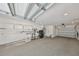 Spacious garage with high ceilings, washer/dryer hookups, water heater, and a utility sink at 12339 138Th N St, Largo, FL 33774