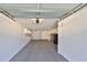 Garage with high ceilings, overhead storage, and a utility sink at 12339 138Th N St, Largo, FL 33774