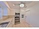 Well-equipped kitchen featuring stainless steel appliances, ample cabinet space, and durable floors at 12339 138Th N St, Largo, FL 33774
