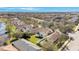 Beautiful aerial view of a residential community with lush landscaping and a serene lake at 15107 Searobbin Dr, Lakewood Ranch, FL 34202