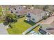 Spacious backyard featuring lush green lawn and privacy fence, perfect for outdoor enjoyment at 15107 Searobbin Dr, Lakewood Ranch, FL 34202