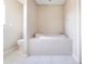 Bathroom with garden tub and tiled surround at 15107 Searobbin Dr, Lakewood Ranch, FL 34202