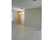 The dining room features tile floors and a modern light fixture next to the front entry at 15107 Searobbin Dr, Lakewood Ranch, FL 34202