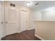 Upstairs hallway with wood flooring at 15107 Searobbin Dr, Lakewood Ranch, FL 34202
