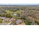 Overview of neighborhood with mature trees, spacious lots, and serene setting at 2727 Brookville Dr, Valrico, FL 33596