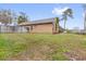 Fenced backyard on a sunny day at 2727 Brookville Dr, Valrico, FL 33596