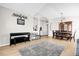 Open living space with a piano, dining table, and stylish decor on wood floors at 2727 Brookville Dr, Valrico, FL 33596
