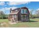 Rustic home featuring multi-level wooden decks with river views at 373 Hile Ln, Punta Gorda, FL 33982