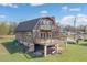 Unique barn style home featuring multi level decks and an open area underneath at 373 Hile Ln, Punta Gorda, FL 33982