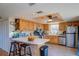 Kitchen features stainless steel appliances, plenty of cabinets, and an island with bar stool seating at 373 Hile Ln, Punta Gorda, FL 33982