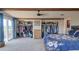 Spacious main bedroom featuring two walk-in closets and sliding door access to a balcony at 373 Hile Ln, Punta Gorda, FL 33982