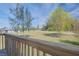 Green landscape view from a wooden deck at 373 Hile Ln, Punta Gorda, FL 33982