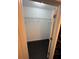 Empty closet featuring black hexagon tile floors and wire shelving at 501 Knights Run Ave # 2106, Tampa, FL 33602