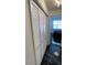 Hallway featuring a closet and opening to a bedroom; note the glossy, decorative flooring at 501 Knights Run Ave # 2106, Tampa, FL 33602