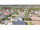 Bird's eye view of the neighborhood, displaying well-kept lawns, mature trees, and a serene environment, close to community amenities at 7108 Harvest Glen Ln, Riverview, FL 33578