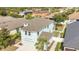 Birds eye view of a well manicured lot in a neighborhood showcasing the back yard and roof at 7108 Harvest Glen Ln, Riverview, FL 33578