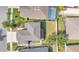 Aerial view of a house with lush landscaping, showing the roof, back yard, and surrounding neighborhood at 7108 Harvest Glen Ln, Riverview, FL 33578
