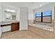 Bathroom featuring a soaking tub and vanity at 7108 Harvest Glen Ln, Riverview, FL 33578