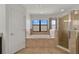 Bathroom shows walk in shower and soaking tub at 7108 Harvest Glen Ln, Riverview, FL 33578