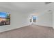 Bright bedroom features neutral carpet and plenty of natural light from the windows at 7108 Harvest Glen Ln, Riverview, FL 33578