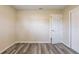 This bedroom has gray wood-look plank floors and neutral paint at 8528 Gold Ridge Cir, Tampa, FL 33619