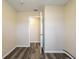 This hallway has gray wood-look plank floors and neutral paint at 8528 Gold Ridge Cir, Tampa, FL 33619