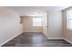 Well-lit living room boasts wood-look floors and offers a welcoming space at 8528 Gold Ridge Cir, Tampa, FL 33619