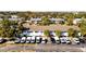 An aerial shot displays a two-story residential complex and multiple parked vans at 2353 Shelley St # 21, Clearwater, FL 33765