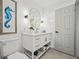 Contemporary bathroom with a sleek vanity, quartz countertop, and decorative seahorse art at 1154 64Th S Ave, St Petersburg, FL 33705
