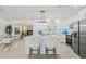Bright and airy kitchen with white cabinets, stainless appliances, and an island perfect for entertaining at 1154 64Th S Ave, St Petersburg, FL 33705