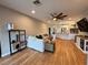 Inviting living room showcasing an open layout with hardwood floors and modern finishes at 34138 Spring Oak Trl, Wesley Chapel, FL 33545