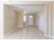 Neutral living room featuring tile flooring and ample natural light at 3603 E Mcberry St, Tampa, FL 33610