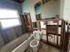 Bathroom undergoing renovation, featuring a bathtub and toilet in a distressed setting at 1501 Delaware Ne Ave, St Petersburg, FL 33703