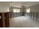 Bedroom undergoing renovations, showing exposed framework and ceiling fan at 1501 Delaware Ne Ave, St Petersburg, FL 33703