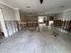 Large open layout blending kitchen and living spaces undergoing renovations at 1501 Delaware Ne Ave, St Petersburg, FL 33703