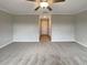 Spacious bedroom with neutral carpet and ceiling fan at 1526 Cassius St, Lutz, FL 33549